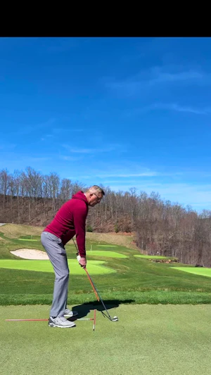 Alignment rod backswing drill