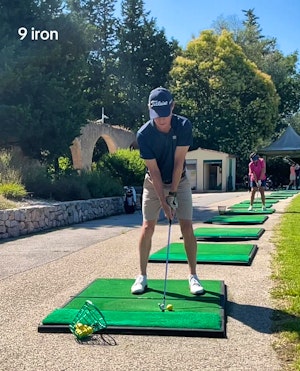 9 iron face on in slow motion 