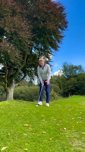 Mastering the Downhill Lie Chip Shot in Golf